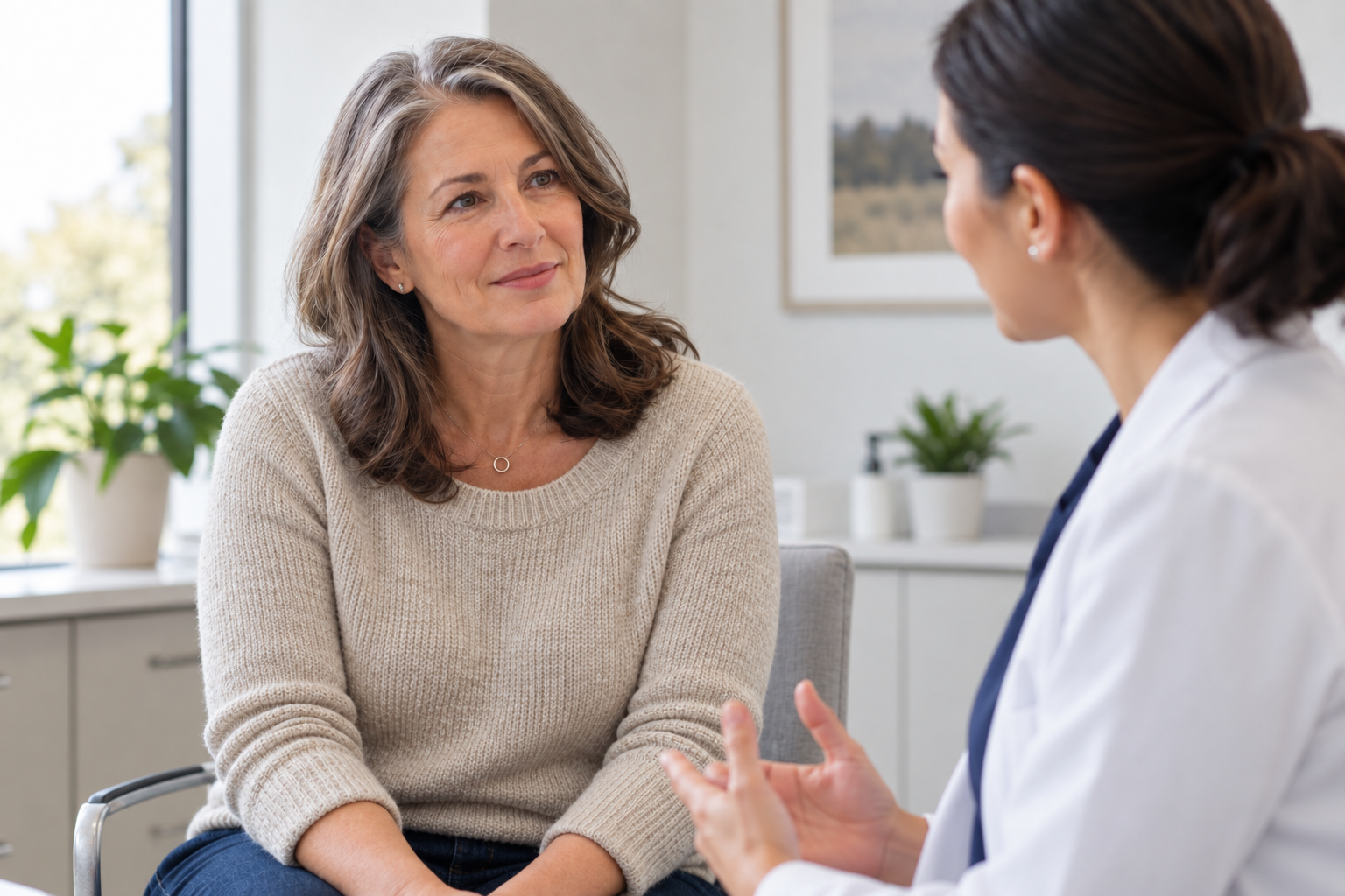 Adult patient speaking with a clinician